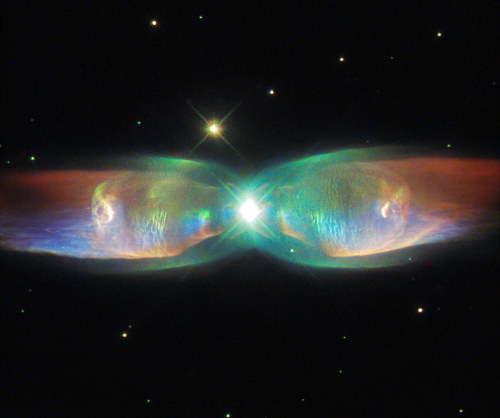 space-pics:  The Twin Jet Nebula by Hubble Space Telescope / ESA