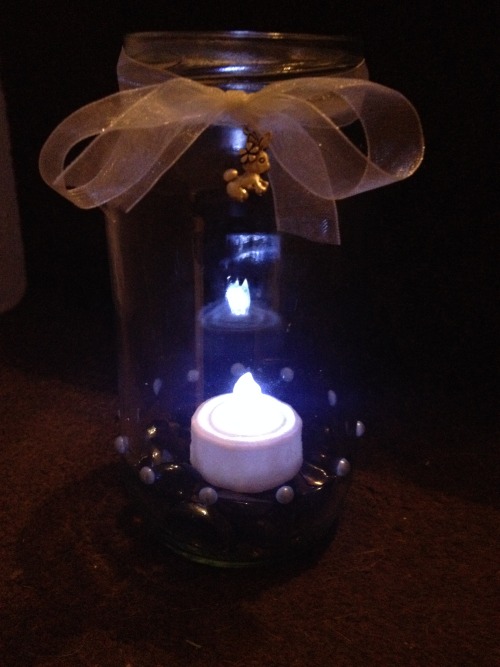 northmcqueen: Hand decorated jam jar tealight holder with rabbit charm & dragon tears. Currently