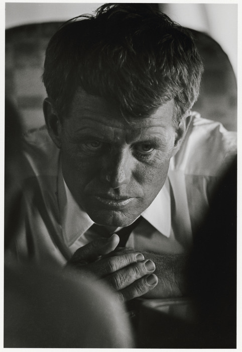 icphoto: R.F.K. Robert F. Kennedy on board a plane to Albany — Cornell Capa, 1964. 