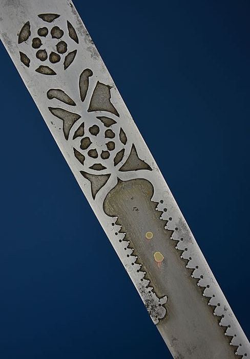 art-of-swords:  Khanda Sword Dated: 19th century Culture: probably Deccan Place of Origin: India Measurements: overall length: 37 inches (940mm); blade length: 30 inches (760mm) The hilt is of Indian ‘basket’ form features a short faceted pommel spike,