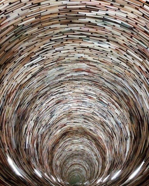 Never-ending book tunnel. Sometimes I want to jump in it. 