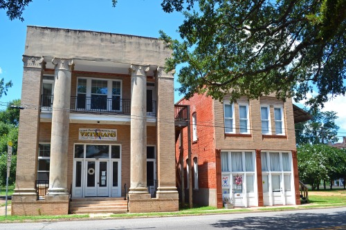 Locals call this the “old bank” building in Colfax, Louisiana.  The square and round columns next to