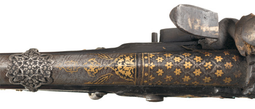 Ornate gold, silver, and pearl decorated flintlock Jezail, Afghanistan, 19th century.