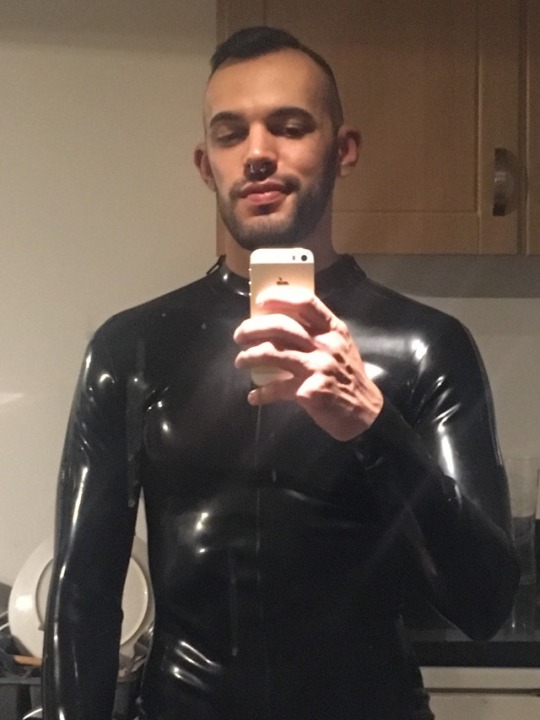 leathersub01:   Every gimp needs some rubber porn pictures