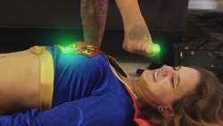www.seductivestudios.com Supergirl is in trouble, and she HATES
