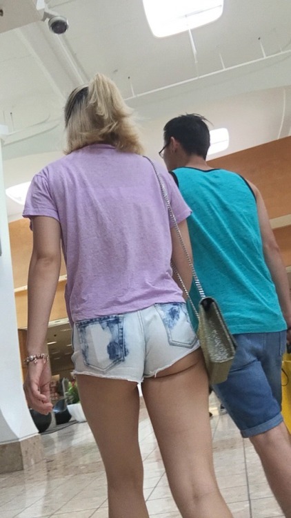 Cute ass cheeks and tie dyed shorts.