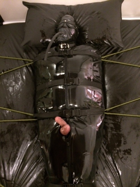 larubbergimp:Me right where I belong as a gimp.  Rubber encased, bound, and abused.  An electro unit was connected to gimps cock shortly after.  gimp moaned and cried, loving every minute of it.