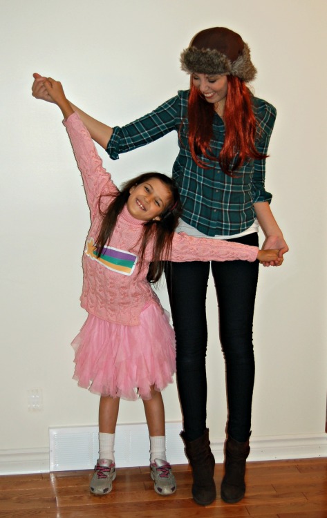 ofpaintedflowers: bribed my mom into taking some pictures of my sister and I in our Halloween costum