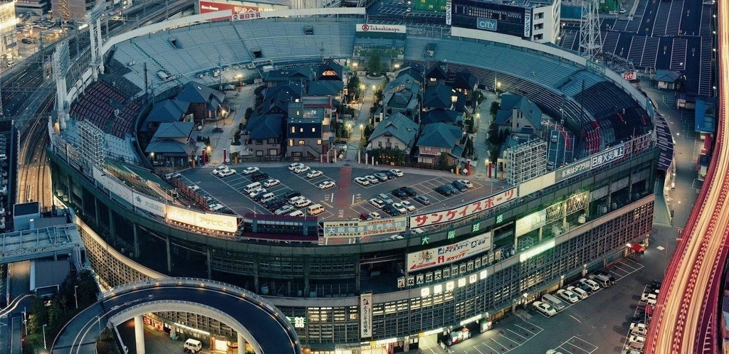 fairwindtree:  sixpenceee:  Model homes inside a retired baseball stadium, Osaka,