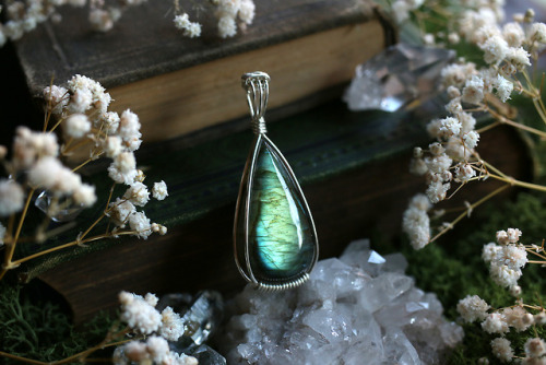 All these beautiful wire wrapped sterling silver labradorite pendants are available at my Etsy Shop 