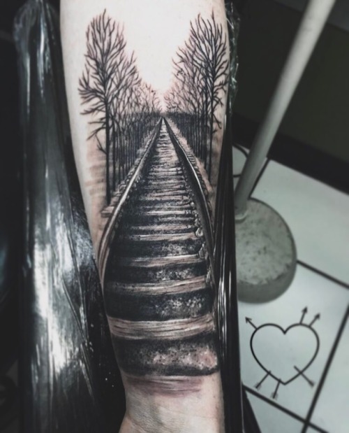 Some fresh black and gray detailed train tracks by artist Chris Reilly at Empire Tattoo Boston @empi