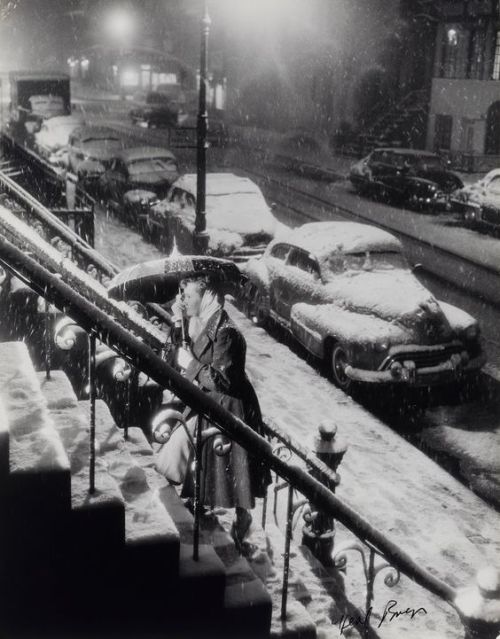 A New Yorker arriving home in the evening. Nov. 7, 1953. - Neal Boenzi 