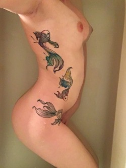 tattooedmafia:  I had this one left over….fish in water?  http://firstimpossiblething.tumblr.com/