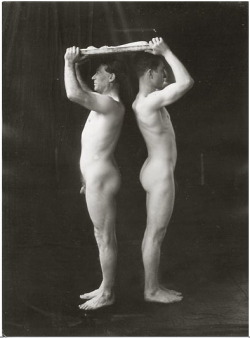 vintagemusclemen: I don’t know what that is they’re holding over their heads.