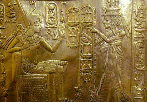 Two gold plaques showing Tutankhamun and his wife Ankhesenamun from the shrine at Tutankhamun’