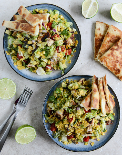 chopped chicken taco salad with cheese quesadilla strips.