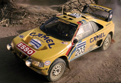 carsthatnevermadeit:  What a difference 27 years makes top Peugeot 405 T16 Dakar, 1988, bottomÂ Peugeot 2008 DKR16, 2015Â 