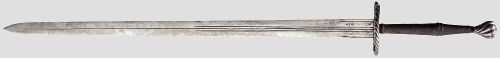 art-of-swords:  German Two-hand Sword  Dated: made in the style of circa 1530 Measurements: overall length 138.5 cm; blade length 106 cm The sword feature a broad double-edged blade cut with a series of narrow fullers both on each side and over the