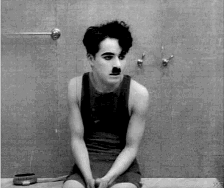 filmforfancy:  Charlie awaits his massage, with slight apprehension, in The Cure, 1917.  