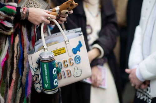 Anya Hindmarch bag and iPhone with Moschino case