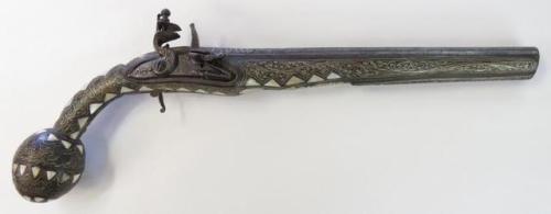 Silver inlaid flintlock pistol with pearl mounts, Syria, mid 19th century.from Auctions Imperial