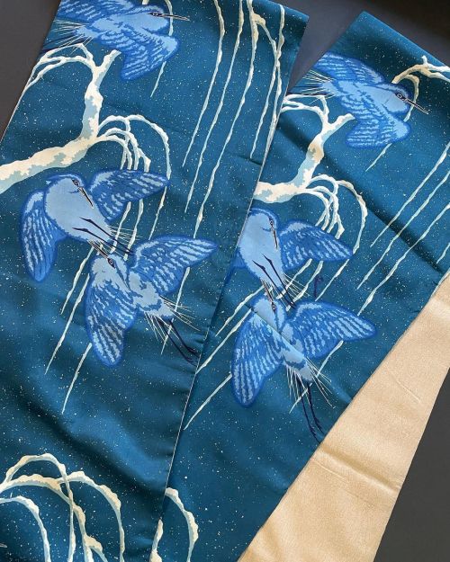 Sagi (herons) flying by a frozen willow under a snowy sky (antique obi seen on).The blueish tones ch