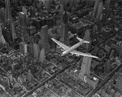 Letsbuildahome-Fr:  Aerial View Of A Dc-4 Passenger Plane Flying Over Midtown Manhattan,