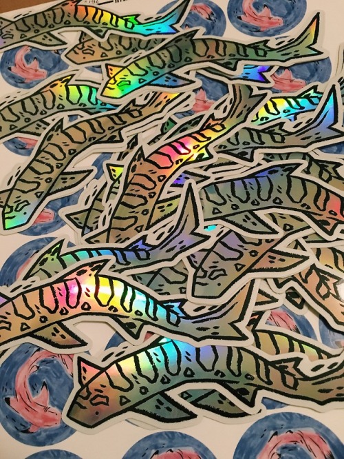 ghostparachutes:i made holographic shark stickers! i’m so in love!! they’re 5″ long and super reflec