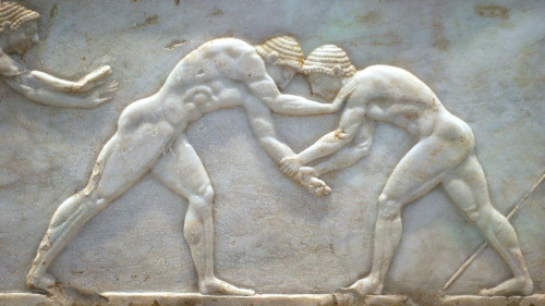 inmemoriaaeterna:Wrestlers in Bas-relief, from Base of Funerary Kouros, 510 BCE.  Athens.