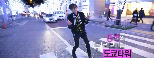 crossgrid:  Trust Jonghyun to stop a crowded street to take a picture == 