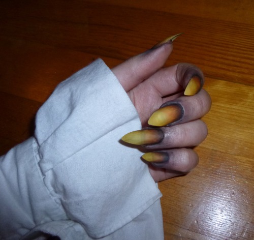 I just found out that you can use acrylic paint to make your nails look like gross claws! You put on