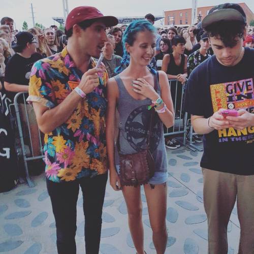  Taylor York and Zac Farro with a fan, Josie at Twenty One Pilots show in Nashville, TN on August 7t