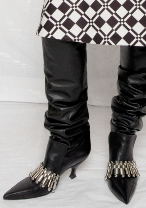 Trendy Boot for FW21: Late 90′s / early 2000′s style grungy metal detail adorn boots.Jil