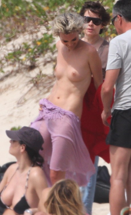 toplessbeachcelebs:  Laeticia Hallyday (Model) nude for a photoshoot on the beach (March 2009) 