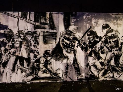 Huge murals seen around Paris in recent months, painted by the radical street art collective Black L