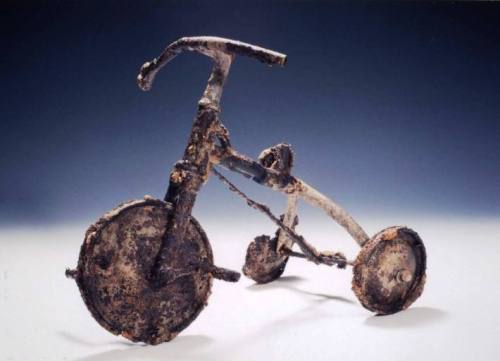 [Image: charred and melted child&rsquo;s tricycle.]68 years ago today, the U.S. dropped the firs