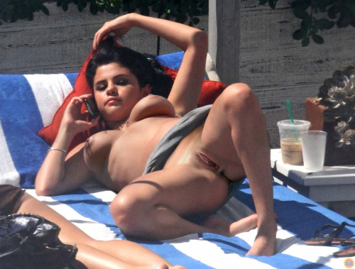 scottssfakes:  Selena Gomez loves to sunbathe adult photos