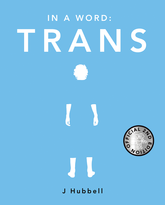 Image shows the 2nd edition of "In A Word: Trans." The book will have a blue front cover, a pink back cover, and a black spine. J really wants there to be a fancy metallic sticker that says 2nd edition as well.