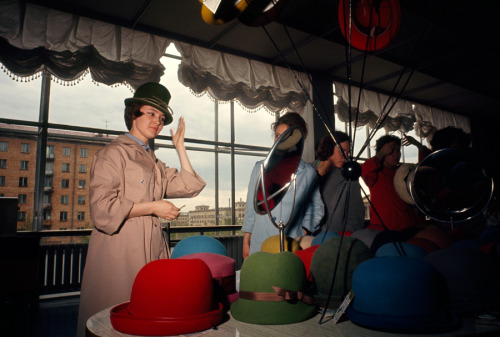 Women try on hats in a variety of colors in Moscow, March 1966.Photograph by Dean Conger, National G