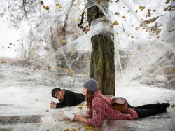 leslieseuffert:  Numen/ For Use - For Use used thick transparent sticky tape to create an interactive installation. By stretching, sticking and wrapping thick layers of tape around grounded pillars, beams, trees or whatever standing objects exist in