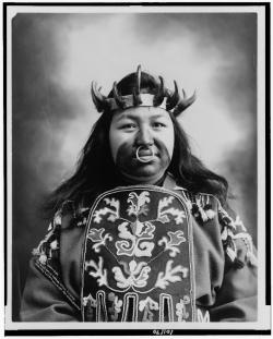 anachoretique:  Kaw-Claa. Thlinget native woman in full potlatch dancing custome 