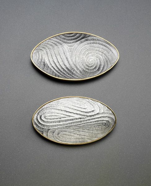 Wayne Victor Meeten Two Oval Brooches Britannia Silver hand fluted with Yellow gold gilding.