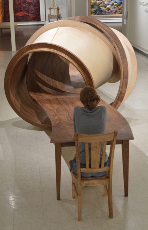 asylum-art:  Wooden Tangled TableArtist Michael Beitz,  known for his impressive benches and tables, just released a new  furniture : the table “Not Now”. The heart of this sculptural table is  tangled like a big knot to avoid any conversation with