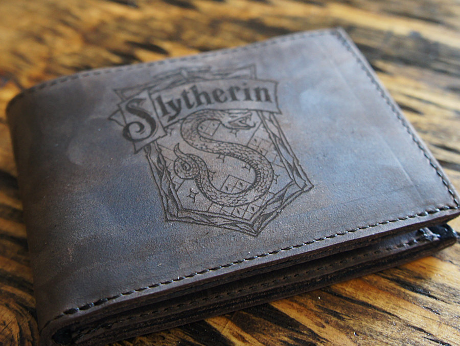 wickedclothes:  Harry Potter House Crest Leather Wallets Although these genuine leather