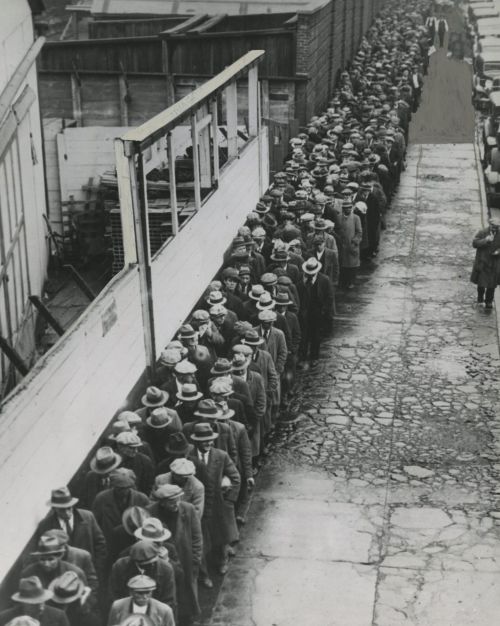agelessphotography:Bread Line - A long line of jobless and homeless men waiting to get a free dinner