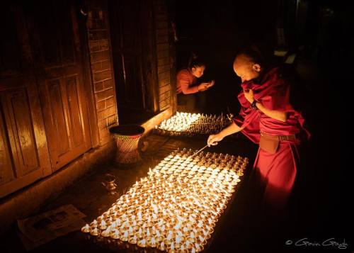 Lighting candles on the evening of the full moon and the eve of...