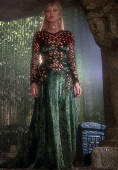 costumeloverz71: Morgana (Helen Mirren) Red cutout dress… Excalibur (1981).. Costume by Bob Ringwood