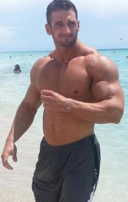 uniformandpiss:  theconsolidator:  Follow The Consolidator.  Hunk on the beach