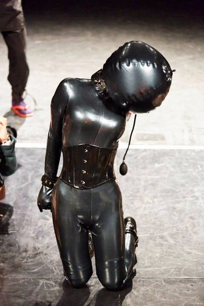 3-holes-2-tits: A good example of how a good hood and a catsuit removes the personality and makes the wearer an anonymous object. 