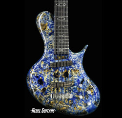 Glorifiedguitars:  Ritter Instruments R8 Singlecut 5 String Bass In Flying Blue [Source: